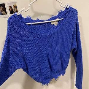 Bright blue distressed sweater
